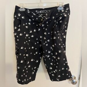 Shredly women’s mountain bike shorts, size 4, black with white birds.